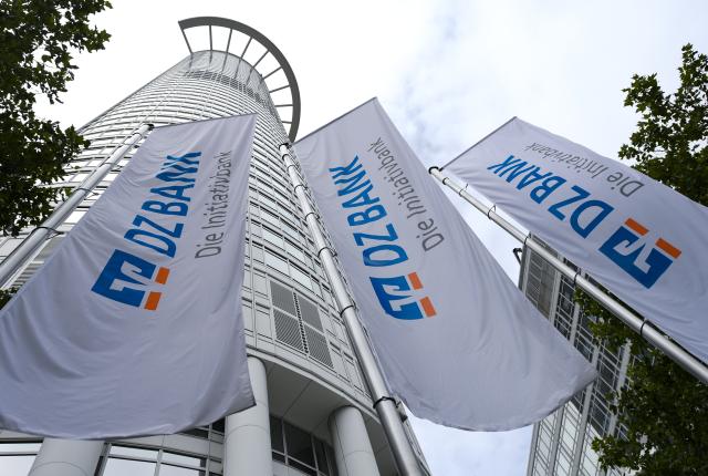 FILED - 25 August 2020, Hesse, Frankfurt/Main: Flags with the inscription "DZ Bank - Die Initiativbank" hang in front of DZ Bank's headquarters. Photo: Arne Dedert/dpa