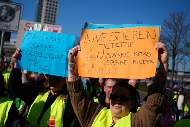 03 March 2026, North Rhine-Westphalia, Dortmund: Employees of the Workers' Welfare Association (AWO) demonstrate holding a banner reading "Solidarity is power". Following several regional warning strikes at AWO facilities, the Verdi union calls for a nationwide AWO strike day in North Rhine-Westphalia. Photo: Bernd Thissen/dpa