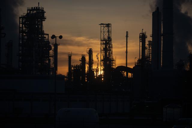 03 March 2026, Baden-Wuerttemberg, Karlsruhe: Industrial plants and chimneys of the Oberrhein mineral oil refinery (MiRO) are seen in backlight. The refinery is one of the most important mineral oil processing sites in Germany. Photo: Marijan Murat/dpa