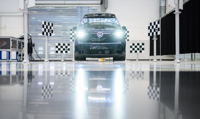 PRODUCTION - 04 March 2026, Lower Saxony, Hanover: A self-driving electric ID. Buzz AD (Autonomous Driving) van stands on the floor of the Volkswagen Commercial Vehicles factory in Hanover. As the plant celebrates the 70th anniversary of the first VW bus, manufactured there on March 8, 1956, Volkswagen offers media an exclusive glimpse inside its main factory. Photo: Julian Stratenschulte/dpa