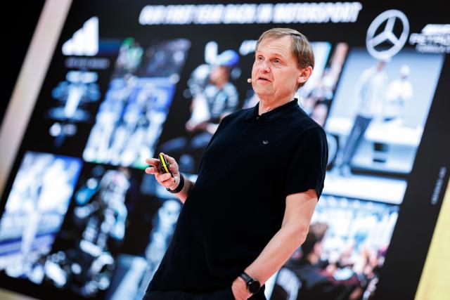 04 March 2026, Bavaria, Herzogenaurach: Bjoern Gulden, CEO of sporting goods manufacturer Adidas AG, stands on stage at the start of the company's annual results press conference. Photo: Daniel Karmann/dpa