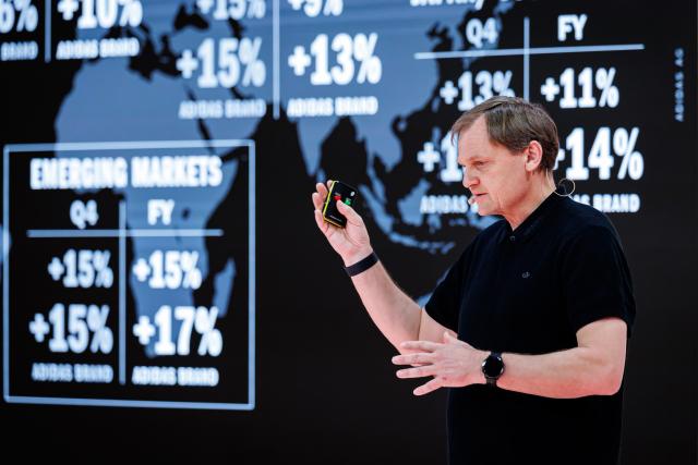 04 March 2026, Bavaria, Herzogenaurach: Bjoern Gulden, CEO of sporting goods manufacturer Adidas AG, stands on stage at the start of the company's annual results press conference. Photo: Daniel Karmann/dpa