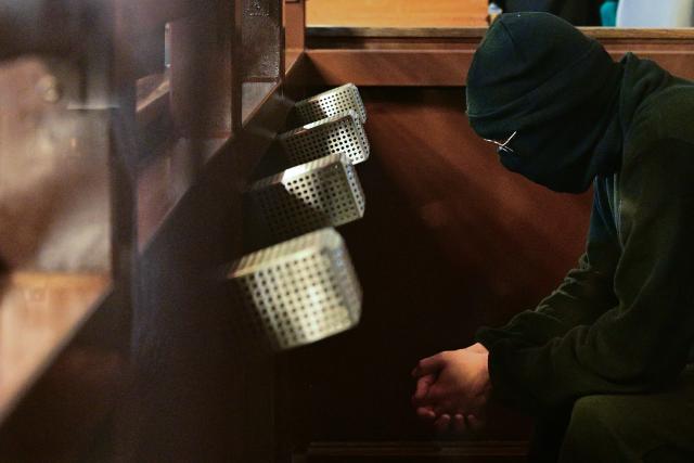 FILED - 20 November 2025, Berlin: The defendant sits in the courtroom of the Moabit Criminal Court at the start of the trial. A Syrian man has been sentenced to 13 years in prison over an attack on a Spanish tourist at the Holocaust Memorial in Berlin last year Photo: Sebastian Gollnow/dpa