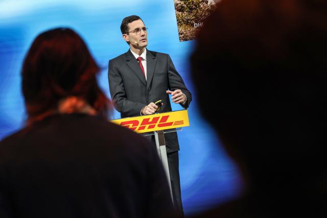 05 March 2026, North Rhine-Westphalia, Troisdorf: Tobias Meyer, CEO of DHL Group, speaks at the annual press conference on the financial year 2025. Photo: Oliver Berg/dpa