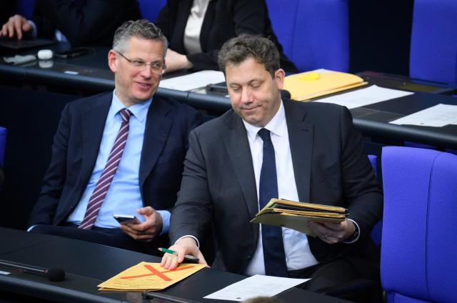 06 March 2026, Berlin: Lars Klingbeil (R), German Minister of Finance, sits next to Christoph de Vries, Parliamentary State Secretary at the Federal Ministry of the Interior, and leaves the 63rd plenary session of the 21st legislative period of the German Bundestag after the debate on the wealth tax. The main topics of today's session are hospital reform, all-day care and the report on Research and Innovation 2026. Photo: Bernd von Jutrczenka/dpa