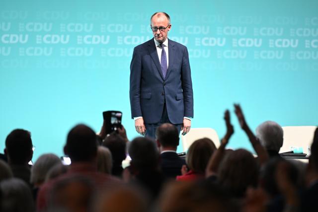 06 March 2026, Baden-Wuerttemberg, Ravensburg: German Chancellor Friedrich Merz stands on stage after his speech at the Oberschwabenhalle during the Christian Democratic Union of Germany (CDU) Baden-Wuerttemberg's campaign ahead of the 2026 state election. Photo: Felix Kästle/dpa