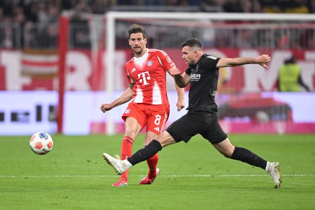 06 March 2026, Bavaria, Munich: Bayern Munich's Leon Goretzka (L) and Borussia Moenchengladbach's Kevin Stoeger battle for the ball during the German Bundesliga soccer match between Bayern Munich and Borussia Moenchengladbach at the Allianz Arena. Photo: Harry Langer/dpa - IMPORTANT NOTICE: DFL and DFB regulations prohibit any use of photographs as image sequences and/or quasi-video.
