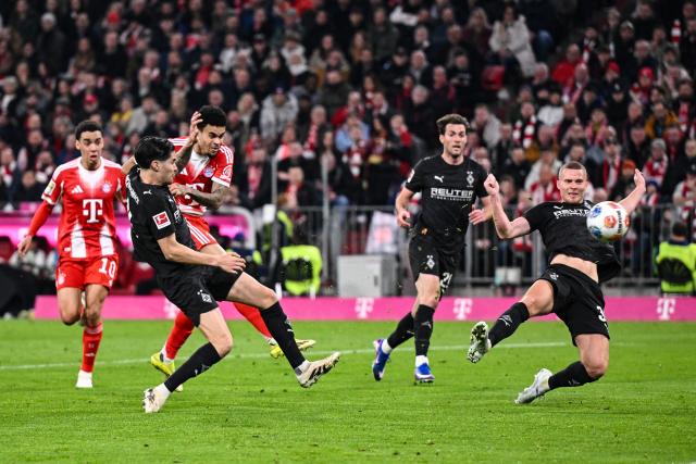 06 March 2026, Bavaria, Munich: Bayern Munich's Luis Diaz (3rd L) scores his side's first goal during the German Bundesliga soccer match between Bayern Munich and Borussia Moenchengladbach at the Allianz Arena. Photo: Harry Langer/dpa - IMPORTANT NOTICE: DFL and DFB regulations prohibit any use of photographs as image sequences and/or quasi-video.