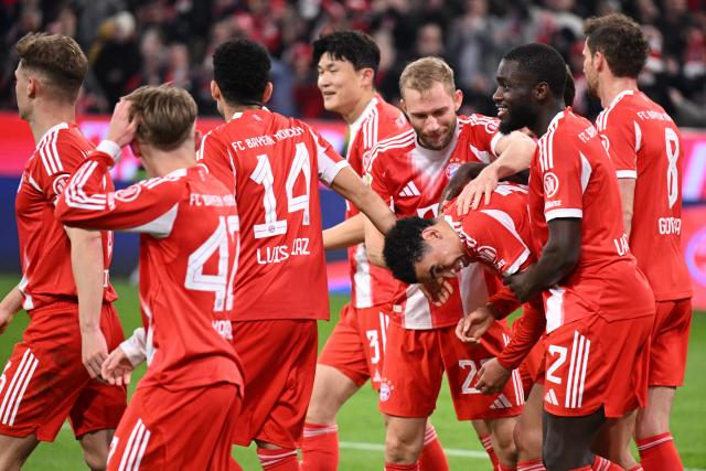 06 March 2026, Bavaria, Munich: Bayern Munich's Jamal Musiala (3rd R) celebrates scoring his side's third goal with teammates during the German Bundesliga soccer match between Bayern Munich and Borussia Moenchengladbach at the Allianz Arena. Photo: Harry Langer/dpa - IMPORTANT NOTICE: DFL and DFB regulations prohibit any use of photographs as image sequences and/or quasi-video.