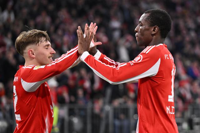 06 March 2026, Bavaria, Munich: Bayern Munich's Nicolas Jackson (R) celebrates scoring his side's fourth goal with teammate Lennart Karl during the German Bundesliga soccer match between Bayern Munich and Borussia Moenchengladbach at the Allianz Arena. Photo: Harry Langer/dpa - IMPORTANT NOTICE: DFL and DFB regulations prohibit any use of photographs as image sequences and/or quasi-video.