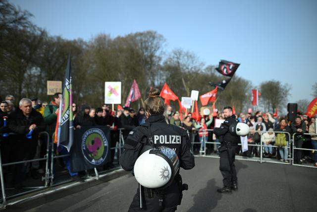 07 March 2026, North Rhine-Westphalia, Marl: A demonstration takes place in front of the entrance to the hall. The state party conference of the AfD NRW with board elections takes place in Marl. Photo: Fabian Strauch/dpa