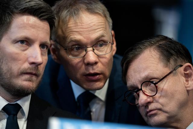 07 March 2026, North Rhine-Westphalia, Marl: Martin Vincentz, state spokesperson of the AfD NRW (l-r), Christian Blex, treasurer of the AfD NRW, and Kay Gottschalk, deputy state spokesperson of the AfD NRW, talk on the podium. The AfD NRW elects a new state executive at a party conference. Photo: Fabian Strauch/dpa