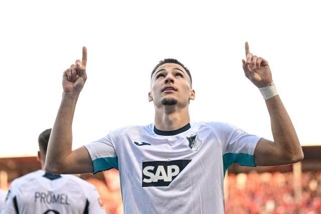 07 March 2026, Baden-Württemberg, Heidenheim: Hoffenheim's Tim Lemperle celebrates scoring his side's fourth goal during the German Bundesliga soccer match between FC Heidenheim and TSG 1899 Hoffenheim at the Voith-Arena. Photo: Harry Langer/dpa - IMPORTANT NOTICE: DFL and DFB regulations prohibit any use of photographs as image sequences and/or quasi-video.