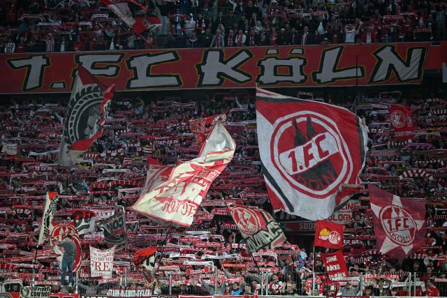 07 March 2026, North Rhine-Westphalia, Cologne: Cologne's fans cheer in the stands during the German Bundesliga soccer match between 1. FC Cologne and Borussia Dortmund at the RheinEnergieStadion. Photo: Federico Gambarini/dpa - IMPORTANT NOTICE: DFL and DFB regulations prohibit any use of photographs as image sequences and/or quasi-video.