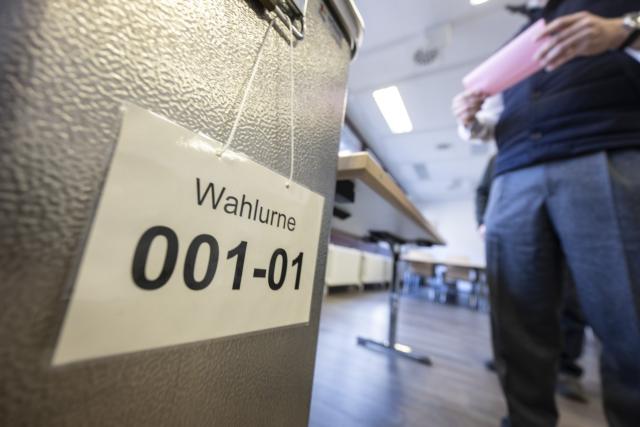 08 March 2026, Baden-Württemberg, Stuttgart: A voter casts his ballot at a polling station in the city center. State elections will be held in Baden-Wuerttemberg on March 8. Photo: Marijan Murat/dpa