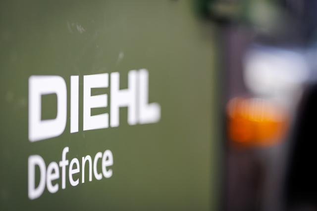 FILED - 23 February 2026, Nuremberg: The Diehl Defence logo can be seen at the company's stand at the Enforce Tac security and defense trade fair. Diehl Defence has been granted permission to collaborate with Norwegian defense contractor Nammo to manufacture artillery ammunition in Germany. Photo: Daniel Karmann/dpa