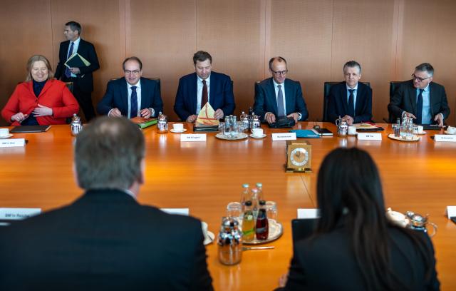 11 March 2026, Berlin: German Chancellor Friedrich Merz (C) speaks at the beginning of the Federal Cabinet meeting in the Federal Chancellery. Photo: Michael Kappeler/dpa