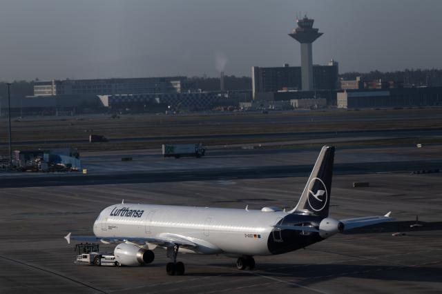 12 March 2026, Hesse, Frankfurt/Main: A Lufthansa passenger plane is being towed onto the apron. Numerous Lufthansa flights have been canceled due to a two-day pilot strike by the Vereinigung Cockpit (VC) union. Photo: Florian Wiegand/dpa
