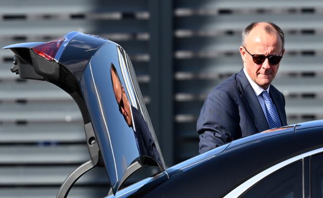 12 March 2026, Brandenburg, Schoenefeld: Germany's Chancellor Friedrich Merz arrives at the military section of Berlin Brandenburg Airport ahead of his trip to Norway to attend the ceremony marking the 75th anniversary of the Federal Criminal Police Office (BKA). Photo: Soeren Stache/dpa