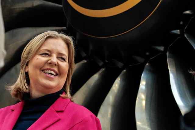 12 March 2026, Brandenburg, Dahlewitz: German Minister of Labor and Social Affairs Baerbel Bas, stands in front of an aircraft engine at the opening of the Regional Skilled Workers Workshop at engine manufacturer Rolls-Royce. Photo: Carsten Koall/dpa