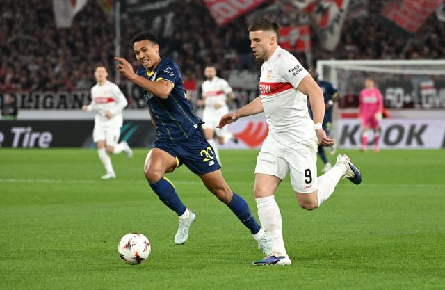 12 March 2026, Baden-Württemberg, Stuttgart: VfB Stuttgart's Ermedin Demirovic and FC Porto's Alberto Costa battle for the ball during the UEFA Europa League round of 16 soccer match between VfB Stuttgart and FC Porto at the MHPArena. Photo: Marijan Murat/dpa