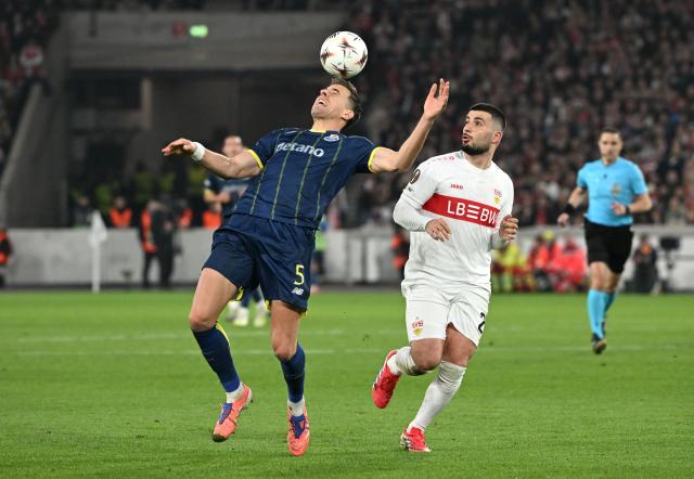 03 December 2026, Baden-Württemberg, Stuttgart: VfB Stuttgart's Deniz Undav and FC Porto's Jan Bednarek battle for the ball during the UEFA Europa League soccer match between VfB Stuttgart and FC Porto at the MHPArena. Photo: Marijan Murat/dpa