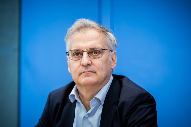 FILED - 25 September 2025, Berlin: Torsten Schmidt, Head of the "Growth, Economy, Public Finance" Competence Center at the Leibniz Institute for Economic Research (RWI), takes part in a press conference on the new economic forecast by leading economic institutes in Berlin. Photo: Christoph Soeder/dpa