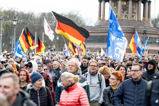 14 March 2026, Berlin: people take part in the "Transparency, rule of law and protection of minors" demonstration to demand clarification of possible German connections in the international Epstein complex. Photo: Fabian Sommer/dpa