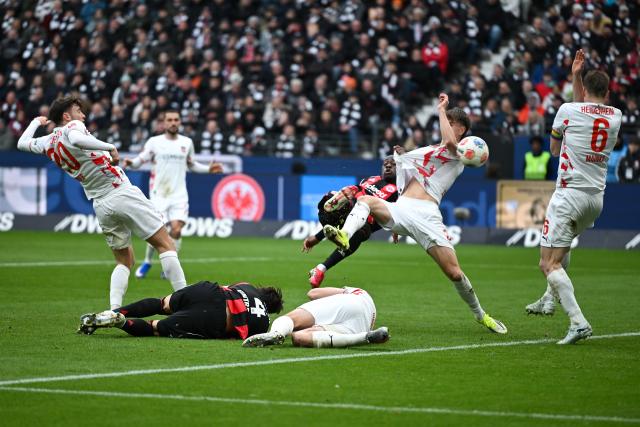 14 March 2026, Hesse, Frankfurt/M.: Frankfurt's Arnaud Kalimuendo scores his side's first goal during the German Bundesliga soccer match between Eintracht Frankfurt and 1. FC Heidenheim at Deutsche Bank Park. Photo: Florian Wiegand/dpa - IMPORTANT NOTICE: DFL and DFB regulations prohibit any use of photographs as image sequences and/or quasi-video.