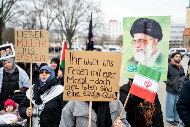 15 March 2026, Berlin: People take part in the demonstration titled "Stop the War Against Iran-Hands Off Lebanon, Palestine, and Iran". Photo: Fabian Sommer/dpa