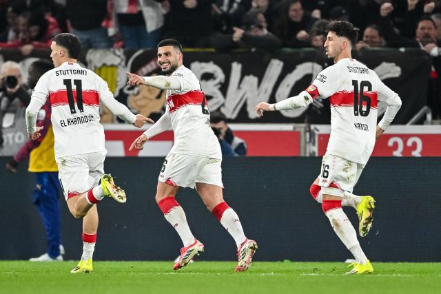 15 March 2026, Baden-Wuerttemberg, Stuttgart: Stuttgart's Deniz Undav (C) celebrates scoring his side's first goal with teammates Bilal El Khannouss (L) and Atakan Karazor during the German Bundesliga soccer match between VfB Stuttgart and RB Leipzig at MHPArena. Photo: Harry Langer/dpa - WICHTIGER HINWEIS: Gemäß den Vorgaben der DFL Deutsche Fußball Liga bzw. des DFB Deutscher Fußball-Bund ist es untersagt, in dem Stadion und/oder vom Spiel angefertigte Fotoaufnahmen in Form von Sequenzbildern und/oder videoähnlichen Fotostrecken zu verwerten bzw. verwerten zu lassen.
