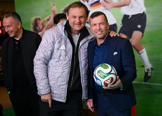 16 March 2026, Bavaria, Munich: Former German footballer Lothar Matthaeus (R) and and CEO of Adidas AG Bjorn Gulden arrive to attend the premiere of the documentary "A Summer in Italy - 1990 World Cup" at the Mathaeser Filmpalast. Photo: Sven Hoppe/dpa