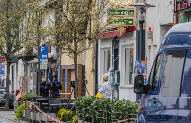 17 March 2026, Hesse, Raunheim: Forensics are investigating the shooting of two people in a restaurant in Raunheim near Frankfurt Airport. According to initial police reports, an armed person entered the bistro at around 3.45 a.m. and shot the two people. Photo: Andreas Arnold/dpa
