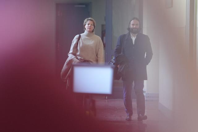 17 March 2026, Hamburg: Christina Block (L), a German restaurateur and entrepreneur, and her defense counsel Ingo Bott (R) arrive at the Hamburg Regional Court for the trial over the alleged abduction of her two children, who were brought from Denmark to Germany in a covert operation on New Year's Eve 2023-24. Photo: Marcus Brandt/dpa