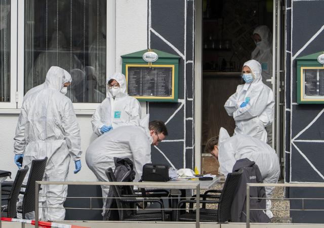 17 March 2026, Hesse, Raunheim: Forensics are investigating at a restaurant in Raunheim near Frankfurt Airport where two people were shot dead. According to initial police reports, an armed person entered the bistro at around 3.45 a.m. and shot the two people. Photo: Andreas Arnold/dpa