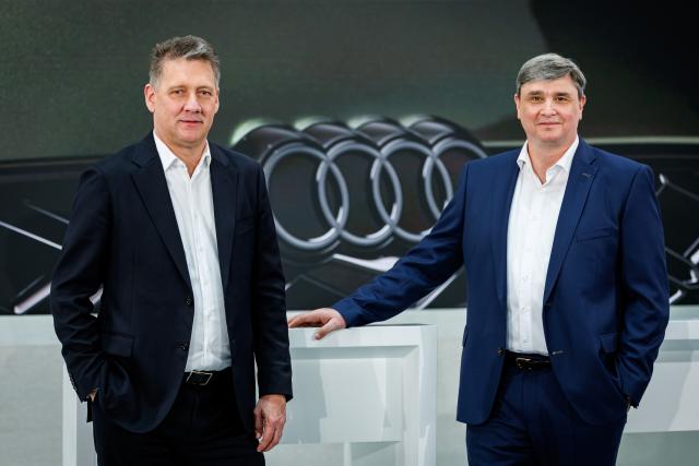 17 March 2026, Bavaria, Ingolstadt: Gernot Doellner (L), CEO of the automaker Audi, stands next to Juergen Rittersberger, Audi's CFO, on the sidelines of the company's annual press conference. Photo: Daniel Karmann/dpa