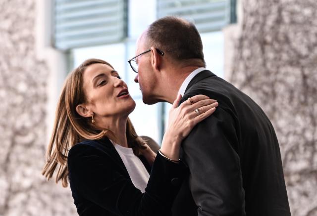 17 March 2026, Berlin: German Chancellor Friedrich Merz greets the President of the European Parliament, Roberta Metsola. Photo: Britta Pedersen/dpa