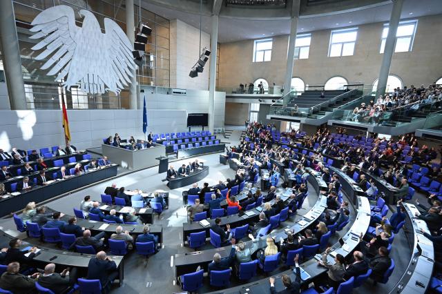 FILED - 05 March 2026, Berlin: Members of parliament raise their hands during the vote in the 62nd session of the German Parliament (Bundestag) in Berlin. Photo: Elisa Schu/dpa