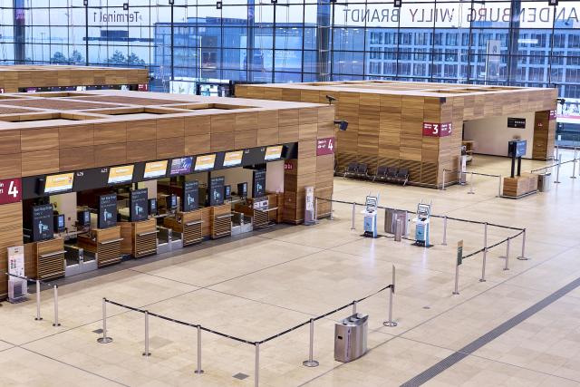 18 March 2026, Brandenburg, Schoenefeld: Terminal 1 at Berlin Brandenburg Airport (BER) is deserted. Due to a warning strike by the Verdi union, no passenger planes take off or land at BER, with all departures and arrivals canceled for the entire day, as previously announced by the airport operator. Photo: Michael Ukas/dpa