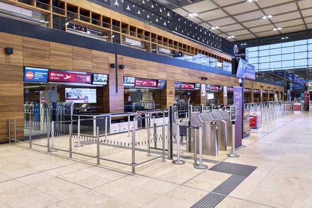 18 March 2026, Brandenburg, Schoenefeld: The security check-in at Terminal 1 of Berlin Brandenburg Airport (BER) is closed due to a warning strike. No passenger flights take off or land at BER, with all departures and arrivals canceled for the entire day, as previously announced by the airport operator. Photo: Michael Ukas/dpa
