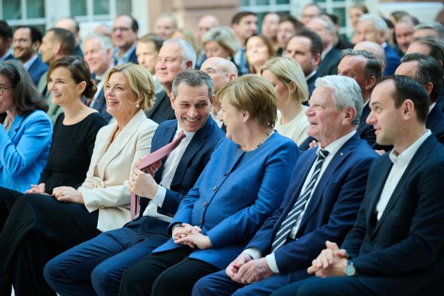 18 March 2026, Berlin: President of the Bundestag Julia Kloeckner (3rd L), Michael Mronz, Former partner of Free Democratic Party (FDP) politician Guido Westerwelle, former Chancellor Angela Merkel and former President Joachim Gauck attend the memorial service marking the 10th anniversary of the FDP politician's death. Photo: Annette Riedl/dpa