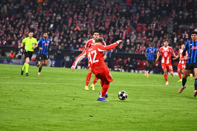 18 March 2026, Bavaria, Munich: Bayern Munich's Lennart Karl scores his side's third goal during the UEFA Champions League Round of 16, Second Leg soccer match between Bayern Munich and Atalanta Bergamo at the Allianz Arena. Photo: Tom Weller/dpa