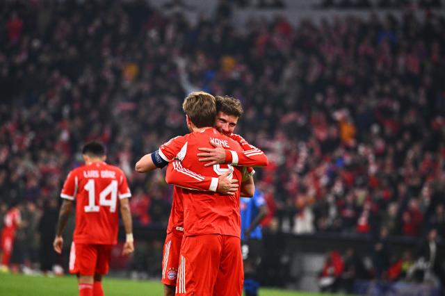 18 March 2026, Bavaria, Munich: Bayern Munich's Harry Kane celebrates scoring his side's second goal with teammate Leon Goretzka during the UEFA Champions League Round of 16, Second Leg soccer match between Bayern Munich and Atalanta Bergamo at the Allianz Arena. Photo: Tom Weller/dpa