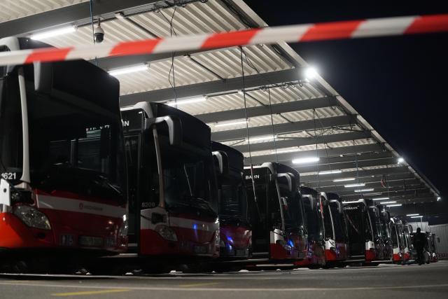 19 March 2026, Hamburg: Buses of Hamburger Hochbahn AG are parked at the Langenfelde bus depot. The Verdi union has called for further warning strikes in public transportation across several states. Photo: Marcus Brandt/dpa