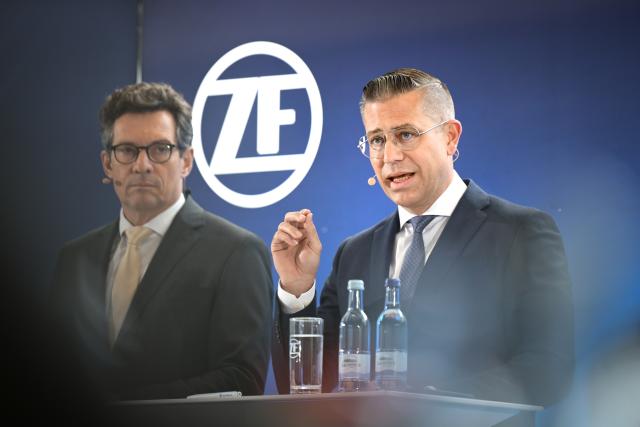 19 March 2026, Baden-Württemberg, Friedrichshafen: Mathias Miedreich (R), Chief Executive Officer (CEO) of ZF Friedrichshafen AG, speaks during the press conference alongside ZF Chief Financial Officer Michael Frick. Photo: Felix Kästle/dpa