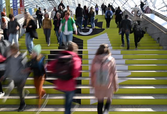 19 March 2026, Saxony, Leipzig: Visitors flock to the Leipzig Book Fair, where exhibitors from over 50 countries are presenting new releases from March 19 to 22 under the motto "Where stories connect us" Photo: Jan Woitas/dpa