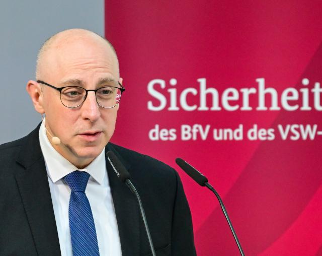 19 March 2026, Berlin: Sinan Selen, President of the Federal Office for the Protection of the Constitution (BfV), speaks at the Allianz Forum during the 19th Security Conference of the Federal Office for the Protection of the Constitution. The event organized by the BfV and the Association for Security in the Economy (VSW) is entitled "Ready to defend? Germany's economy in times of hybrid attacks". Photo: Soeren Stache/dpa