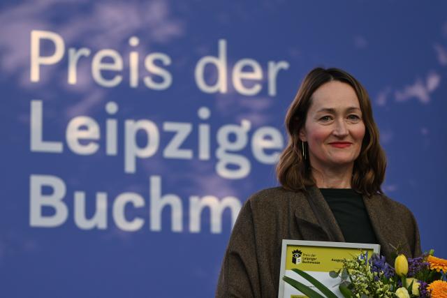 19 March 2026, Saxony, Leipzig: Katerina Poladjan, author of the book *Goldstrand*, takes the stage after receiving the Leipzig Book Fair Prize in the fiction category. Photo: Hendrik Schmidt/dpa