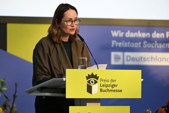 19 March 2026, Saxony, Leipzig: Katerina Poladjan, author of the book *Goldstrand*, speaks after receiving the Leipzig Book Fair Prize in the fiction category. Photo: Hendrik Schmidt/dpa