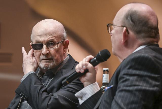 19 March 2026, Brandenburg, Potsdam: Indian-British novelist Salman Rushdie (L) and literary critic Denis Scheck present new collection of short stories, *The Eleventh Hour*, at the Nikolaisaal as part of the "LIT: potsdam" literary festival. Photo: Jens Kalaene/dpa